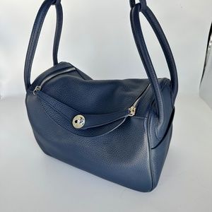Navy handbag that wishes it were a real Hermes Lindy
